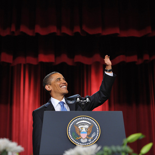 US President Barack Obama waves as he ar
